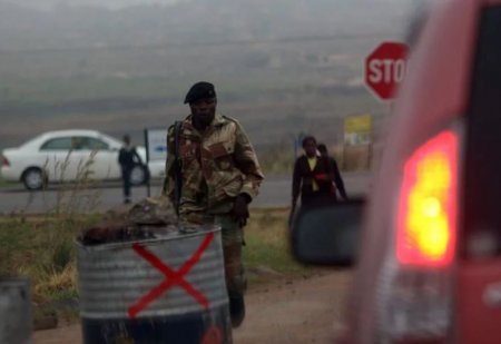 PHOTOS As Tensions Rise In Zimbabwe Over Military Clampdown