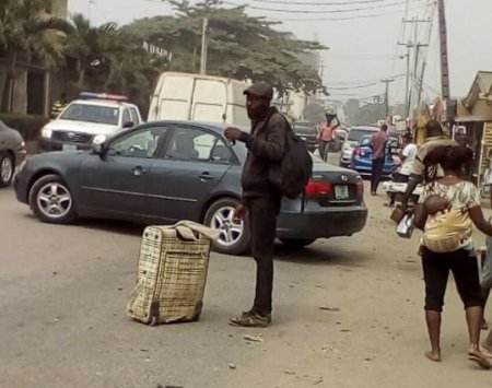 Shortly After Arriving From London For Xmas, Man Goes Insane, Roams The Street Of Lagos [PHOTOS]