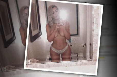 kim-kardashian-poses-topless-pp.webp