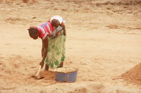 A woman with her baby - nigeria metro news - sahara reporters news.jpg