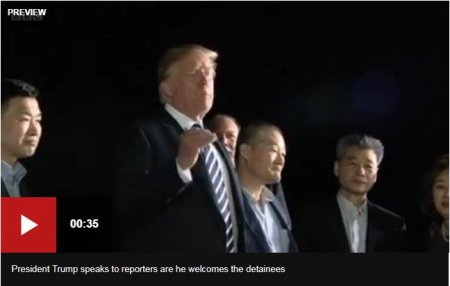 donald trum and detainees.JPG