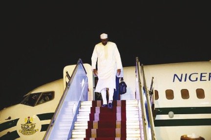 president buhari returns to abuja.jpg
