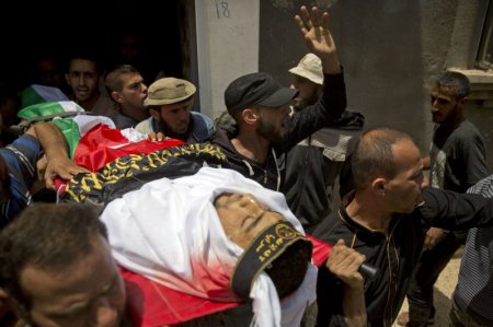 palestinian mourners.jpg