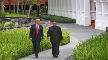 trump kim walk.jpg