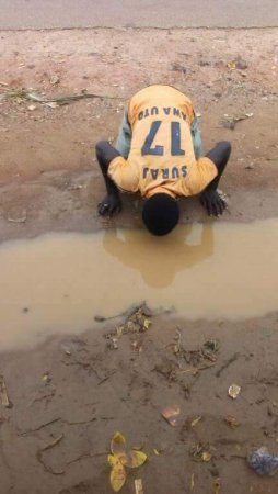 Linda Ikeji's blog-Man drink Muddy water.jpg