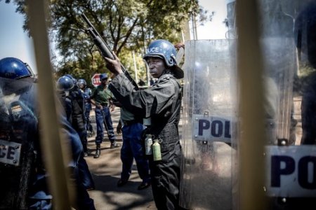 Punch-nigeria-newspaper-Zimbabwean anti riot police officers.jpg