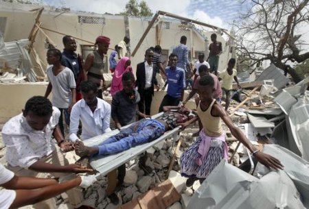 IOL News-Rescuers carry away a wounded civilian.jpg