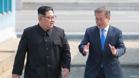 premium Times Nigeria-Kim Jong Un and Moon Jae In.jpg