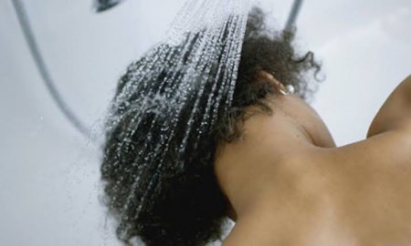 Black-woman-washing-her-hair.jpg