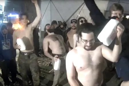 video showing men chugging milk.webp