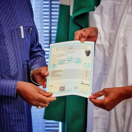 Photos Of President Buhari Receiving His WAEC Certificate.jpg