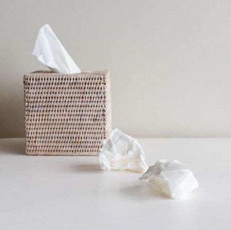 tissue-box-and-crumpled-tissues-on-white-table-royalty-free-image-940361638-1543615318.jpg
