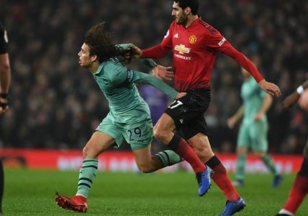 Matteo Guendouzi and' Marouane Fellaini.jpg