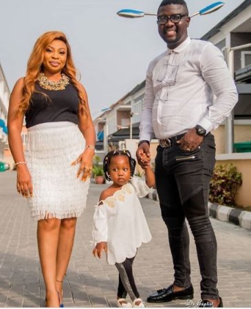 Seyi Law, wife and daughter.JPG