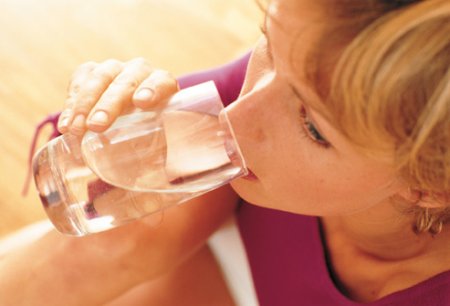 getty_rm_photo_of_woman_drinking_water_from_glass.jpg