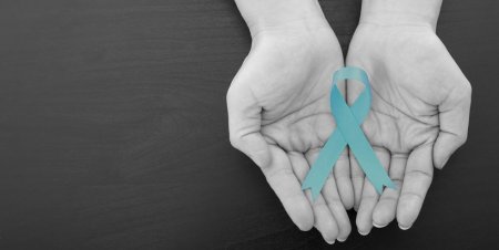 ovarian-cancer-green-ribbon-royalty-free-image-836527802-1547666052 (1).jpg