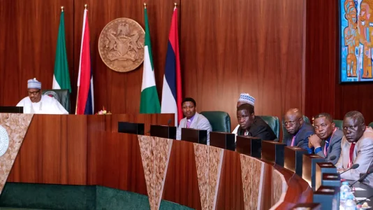 buhari and aides.webp