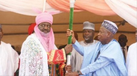 Ganduje presenting staff of office to an emir.jpg