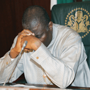 jonathan-tired-and-bowed-his-head-in-presidential-seat.png