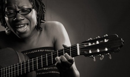 Asa playing a guitar.jpg