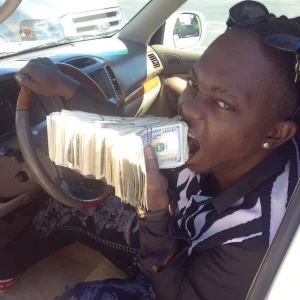 Waconzy flaunting $100,000 (1).webp