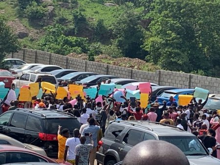 Protesters storm COZA Headquaters in Abuja.jpeg