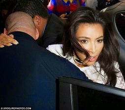 Kim Kardashian rescued by her bodyguard 2.jpg