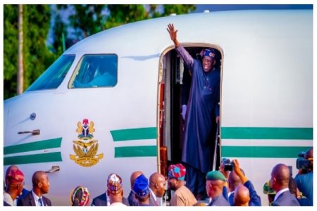 Tinubu Returns to Abuja After COP28 Summit: Key Talks and Controversy Surrounding Delegates
