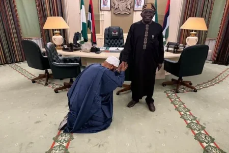 18186303_nigerstategovernormohammedumarbagokneelstogreetpresidenttinubuatthevillaearliertoday...webp