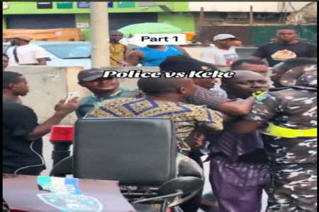 [Video]Lagos State: Nigerian Police Officer and Keke Driver Strangle Each Other