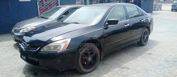 Affordable Luxury: 2003 Black Honda Accord Ready for a New Owner