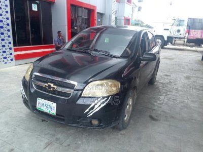 For Sale: 2002 Chevrolet Aveo - Sleek Black, Low Mileage, Fully Registered.