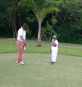 Osita Iheme playing golf 1.jpg