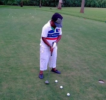 Osita Iheme playing golf 2.jpg