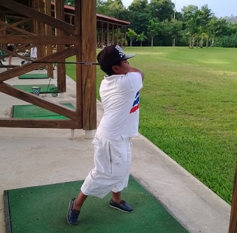 Osita Iheme playing golf 3.jpg