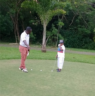 Osita Iheme playing golf 4.jpg
