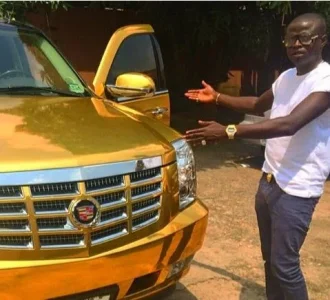 Kcee 2014 gold coloured Cadillac Escalade 1.webp