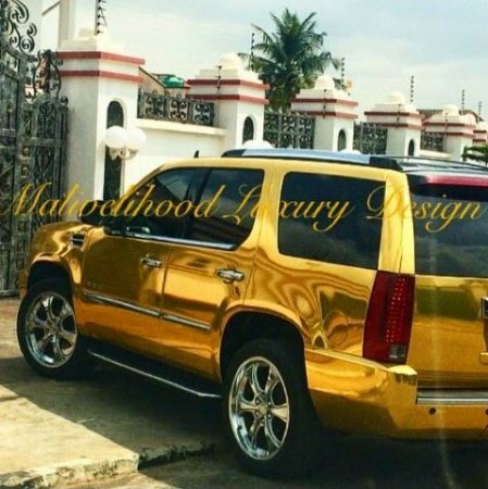 Kcee 2014 gold coloured Cadillac Escalade 2.JPG