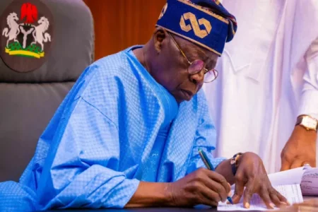 President Tinubu SIGNS (1).webp President Tinubu SIGNS (1).webp
