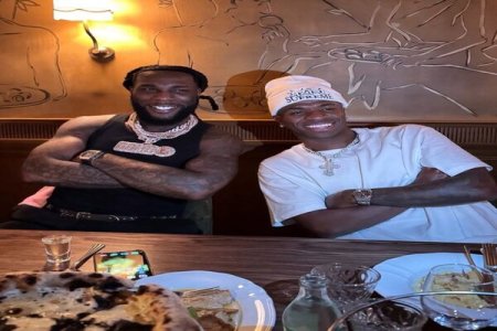 Burna Boy Meets Real Madrid Stars in Paris, Gets Signed Jerseys