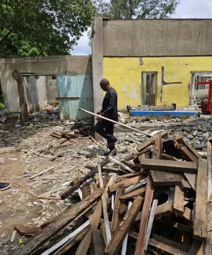 Obi in his brothers demolished building.webp Obi in his brothers demolished building.webp