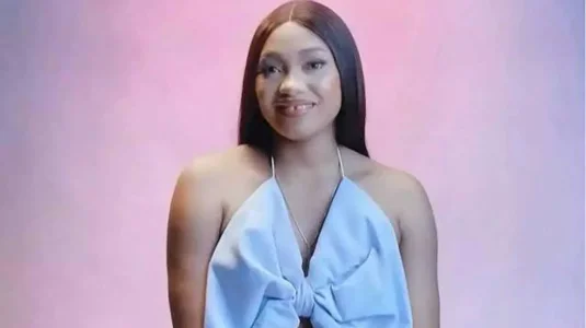 [VIDEO] BBNaija Star Chomzy Relaxes in SUV During NYSC Drill, Sparks Backlash