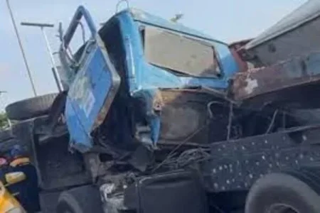 Three Escape Death as Container Falls on Car at Lagos' Daleko Bridge