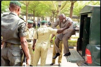 olisa metuh in handcuffs.jpg