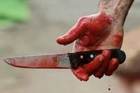 knife with blood.webp