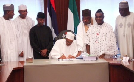 buhari signing budget.jpg