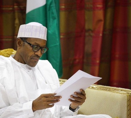 BUHARI-reading.jpg