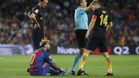 messi injured.jpg