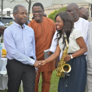 Tuke Morgan and the Vice President of the Federal Republic of Nigeria Professor Yemi Osibanjo.webp