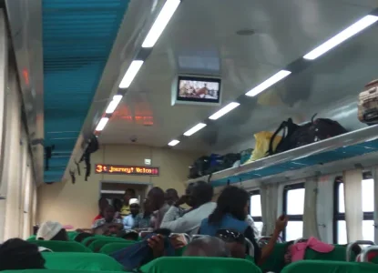 passengers standing snipped.webp passengers standing snipped.webp